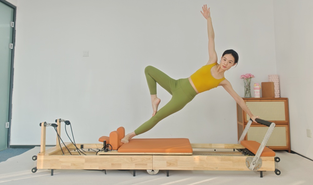 Balance corporelle en bois pliant Pilates réformateur de lit de base